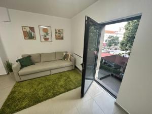 Posezení v ubytování Green Central Apartment