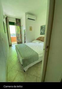 Кровать или кровати в номере Casa centralissima Torre dell Orso 100m dal mare