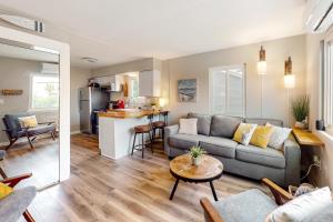 a living room with a couch and a table at AL-BE Vacation Villas # 5 in Ocean City