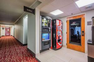 a hallway with two vending machines in a hotel at Hampton Inn Tampa International Airport/Westshore in Tampa