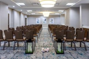 a room with rows of chairs in a room at Hilton Garden Inn Roanoke in Roanoke