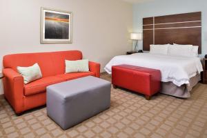 Postel nebo postele na pokoji v ubytování Hampton Inn and Suites Hutto