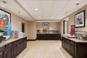 a lobby of a store with counters and a food counter at Hampton Inn & Suites Mount Joy/Lancaster West, Pa in Manheim