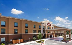 eine Darstellung eines Hotelgebäudes in der Unterkunft Hampton Inn and Suites Georgetown/Austin North, TX in Georgetown