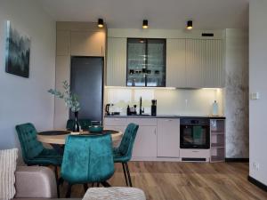 Η κουζίνα ή μικρή κουζίνα στο Apartament Zielona Dolina