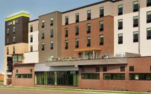 una representación de la parte delantera de un edificio en Home2 Suites by Hilton Minneapolis Bloomington en Bloomington