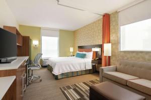 TV a/nebo společenská místnost v ubytování Home2 Suites by Hilton Minneapolis Bloomington