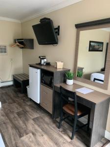 Kuchyň nebo kuchyňský kout v ubytování Cairns Motel