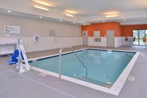 a large swimming pool in a hospital at Hampton Inn and Suites Ames, IA in Ames