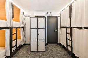 Postel nebo postele na pokoji v ubytování Parc Avenue Hostel