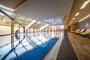 Bazén v ubytování DoubleTree by Hilton Hotel Sighisoara - Cavaler nebo v jeho okolí