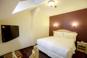 TV a/nebo společenská místnost v ubytování DoubleTree by Hilton Hotel Sighisoara - Cavaler