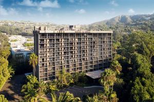 an aerial view of a building with trees at Hotel La Jolla, Curio Collection by Hilton in San Diego