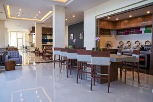 Area soggiorno di Hampton Inn by Hilton Irapuato