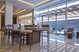 Area soggiorno di Hampton Inn by Hilton Irapuato