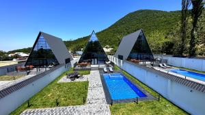 a swimming pool on the roof of a building at Qafqaz Falcon Chalet in Gabala