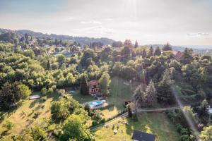 an aerial view of a house in a forest at Fruska Pool House in Sremska Kamenica