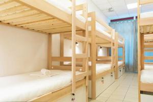 Postel nebo postele na pokoji v ubytování Gravitas Hostel