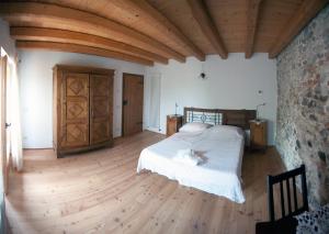 Postel nebo postele na pokoji v ubytování B&B La Valle dell'Albero