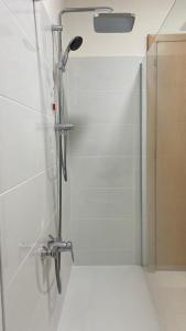 a shower with a glass door in a bathroom at Casa Valentina 2 in Perugia +36 photos