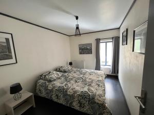 Postel nebo postele na pokoji v ubytování le logis du désert