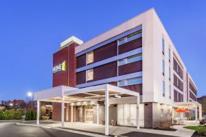 a rendering of the front of a hotel at Home2 Suites by Hilton Albany Airport/Wolf Rd in Albany