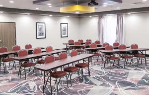 a conference room with tables and chairs in it at Hampton Inn & Suites Amarillo East in Amarillo