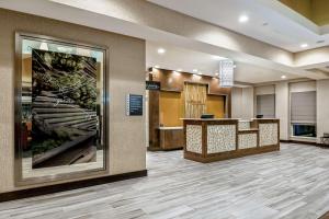 a lobby of a hospital with a waiting room at Hilton Garden Inn San Marcos in San Marcos