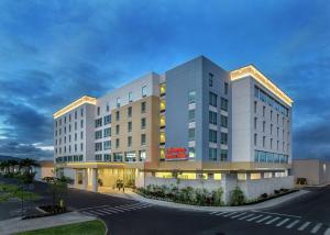 a rendering of a hotel building at dusk at Hampton Inn & Suites Oahu/Kapolei, HI - FREE Breakfast in Kapolei