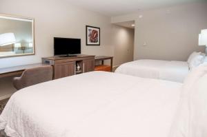 Ένα ή περισσότερα κρεβάτια σε δωμάτιο στο Hampton Inn Opelousas +29 φωτογραφίες