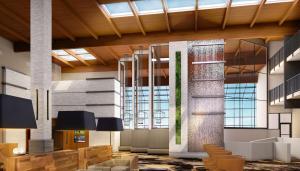 a lobby with a large building with windows at Doubletree By Hilton Mt. Vernon in Mount Vernon