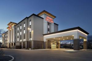 a hotel with a sign on the front of it at Hampton Inn & Suites St. Louis/Alton, IL in Alton