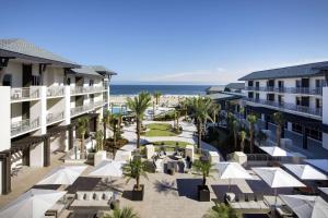 an aerial view of the resort and the beach at Embassy Suites St Augustine Beach Oceanfront Resort in Saint Augustine Beach