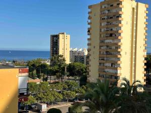 a view of a city with buildings and the ocean at Apartamento en Aguadulce sur in Aguadulce