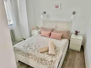 Voodi või voodid majutusasutuse Apartamento Acacias toas