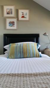 Katil atau katil-katil dalam bilik di Gallery Guest House