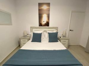 Postel nebo postele na pokoji v ubytování Apartaments L’ARC