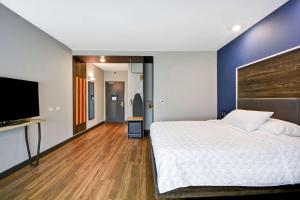 Postel nebo postele na pokoji v ubytování Tru By Hilton Sumter + 26 fotografií