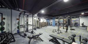 a gym with a bunch of machines in a room at Hilton Garden Inn Yalova in Yalova