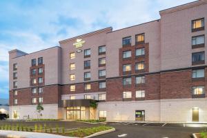 eine Darstellung der Vorderseite des Hotels in der Unterkunft Homewood Suites By Hilton Ottawa Airport in Ottawa