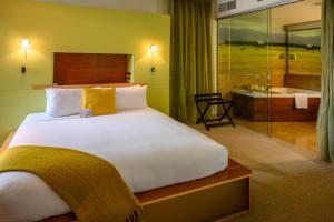 Cama ou camas em um quarto em Ohtel Wellington