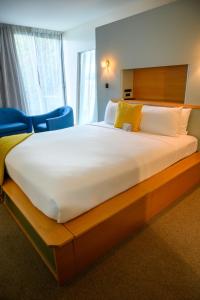 Cama ou camas em um quarto em Ohtel Wellington