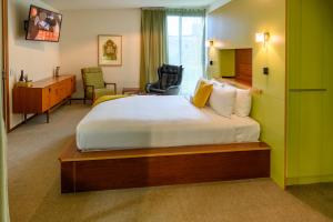 Cama ou camas em um quarto em Ohtel Wellington
