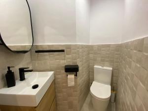Koupelna v ubytování Apartaments L’ARC