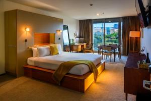 Cama ou camas em um quarto em Ohtel Wellington