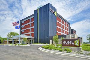 a rendering of the front of a hotel at Home2 Suites By Hilton Plymouth Minneapolis in Plymouth