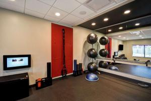 a bowling alley with a ball racked at Tru By Hilton Fort Wayne in Fort Wayne