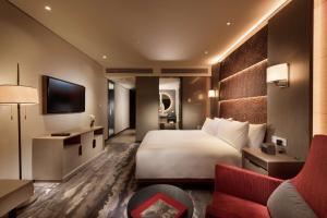 Hilton Port Moresby Hotel & Residences客房内的一张或多张床位