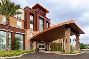 a rendering of the front of a hotel at Hampton Inn & Suites Buena Park in Buena Park