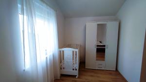 A bed or beds in a room at Holiday Home Aurora